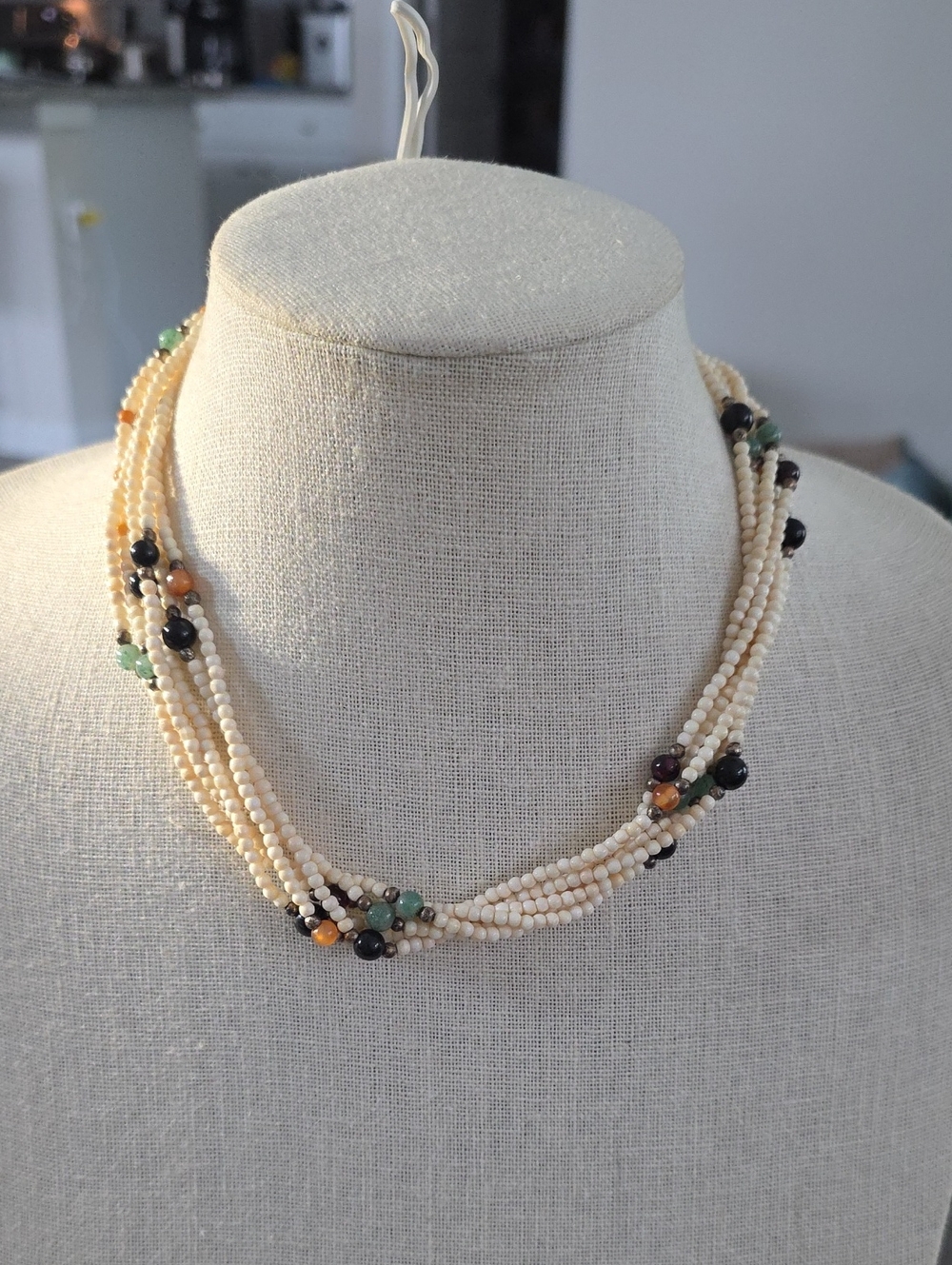 Multi-Strand Cream Beaded Necklace with Green and Black Accent Stone Beads